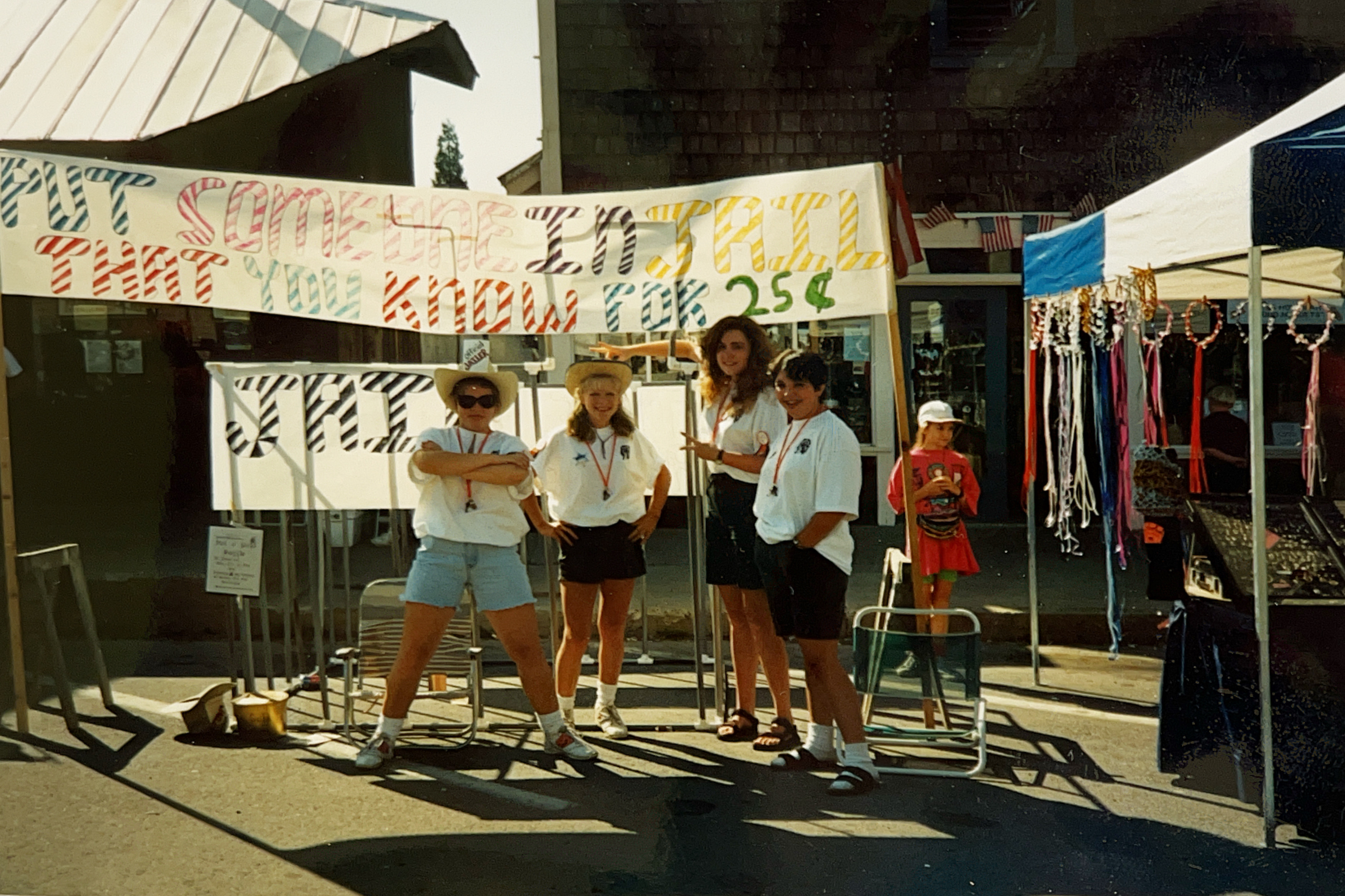 Teenagers at a Gold Diggers booth in the 1990s