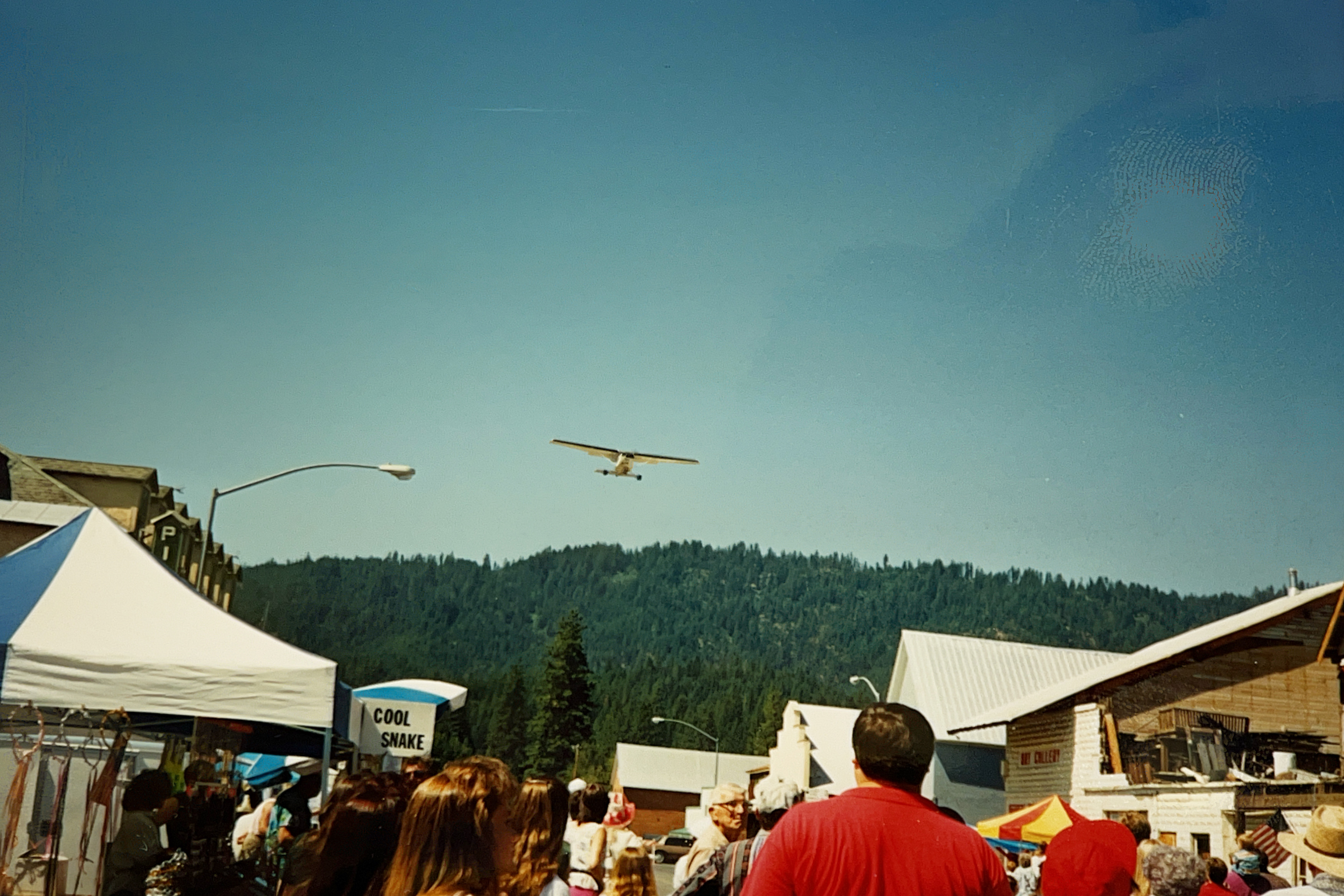 Tom Rahn's airplane flying over the Gold Diggers parade